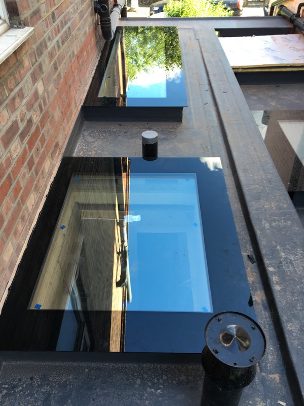 Multiple flat roof skylights on extension in Abingdon